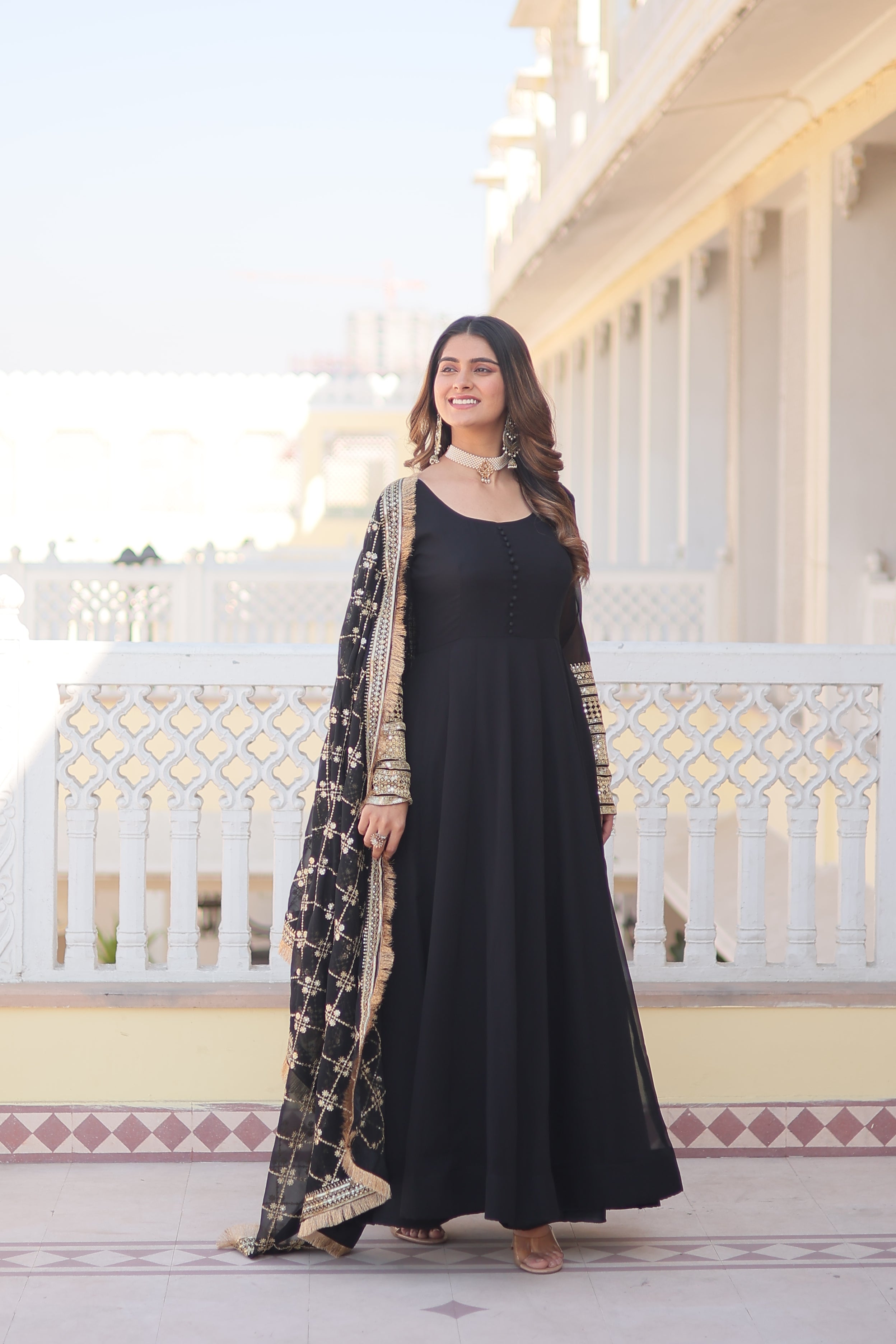 Teal embroidered georgette partywear long gown for women