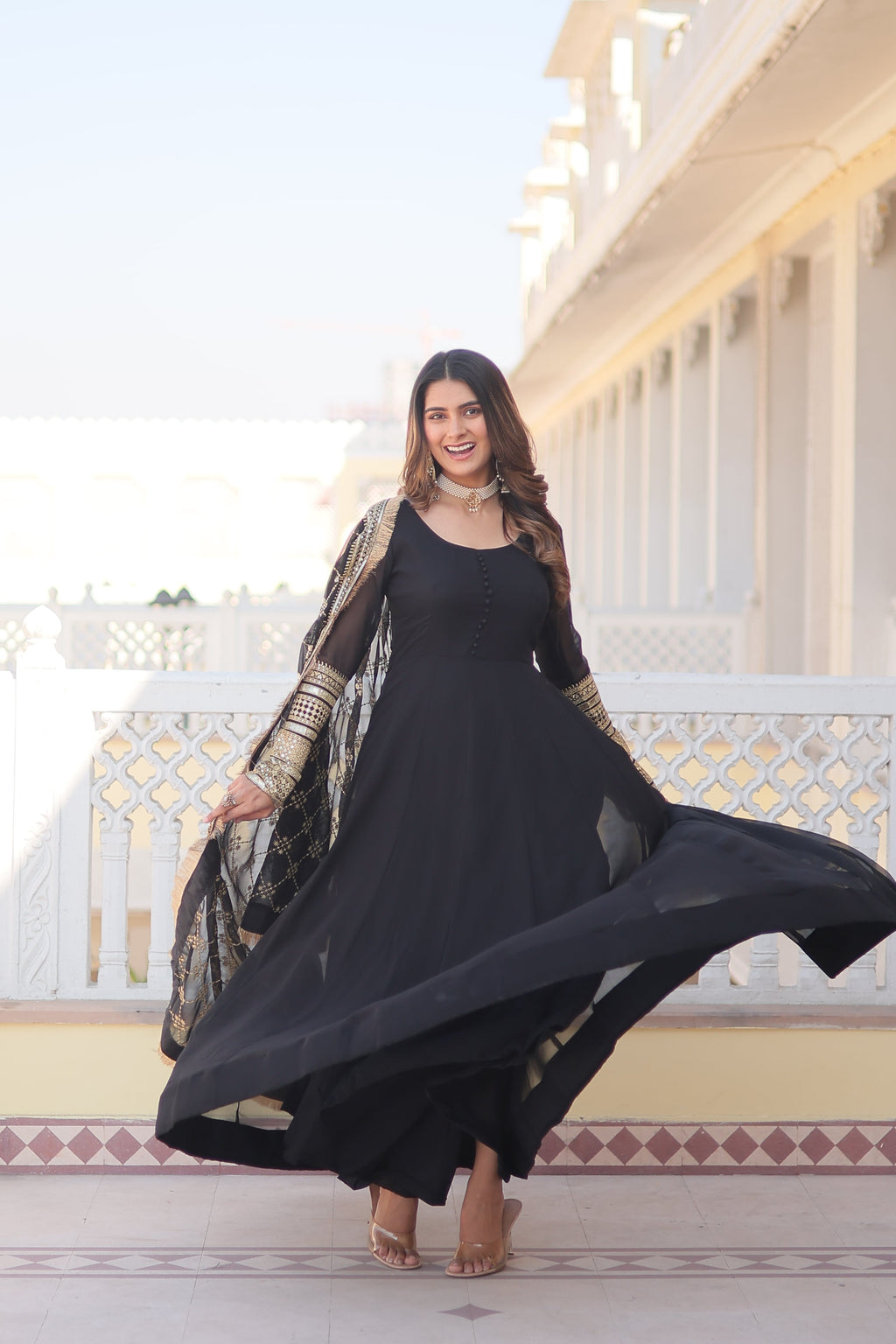 Teal embroidered georgette partywear long gown for women