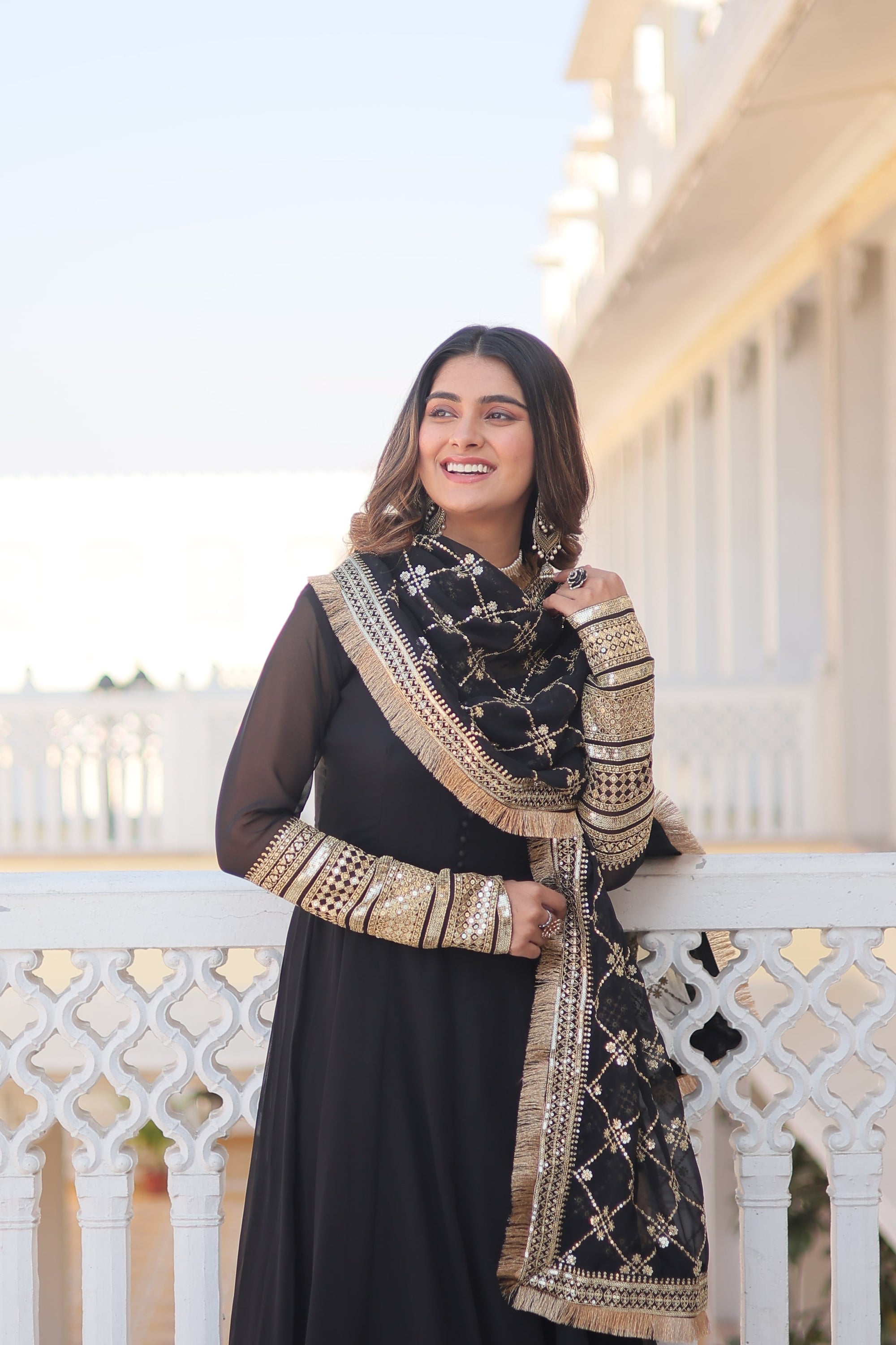Teal embroidered georgette partywear long gown for women