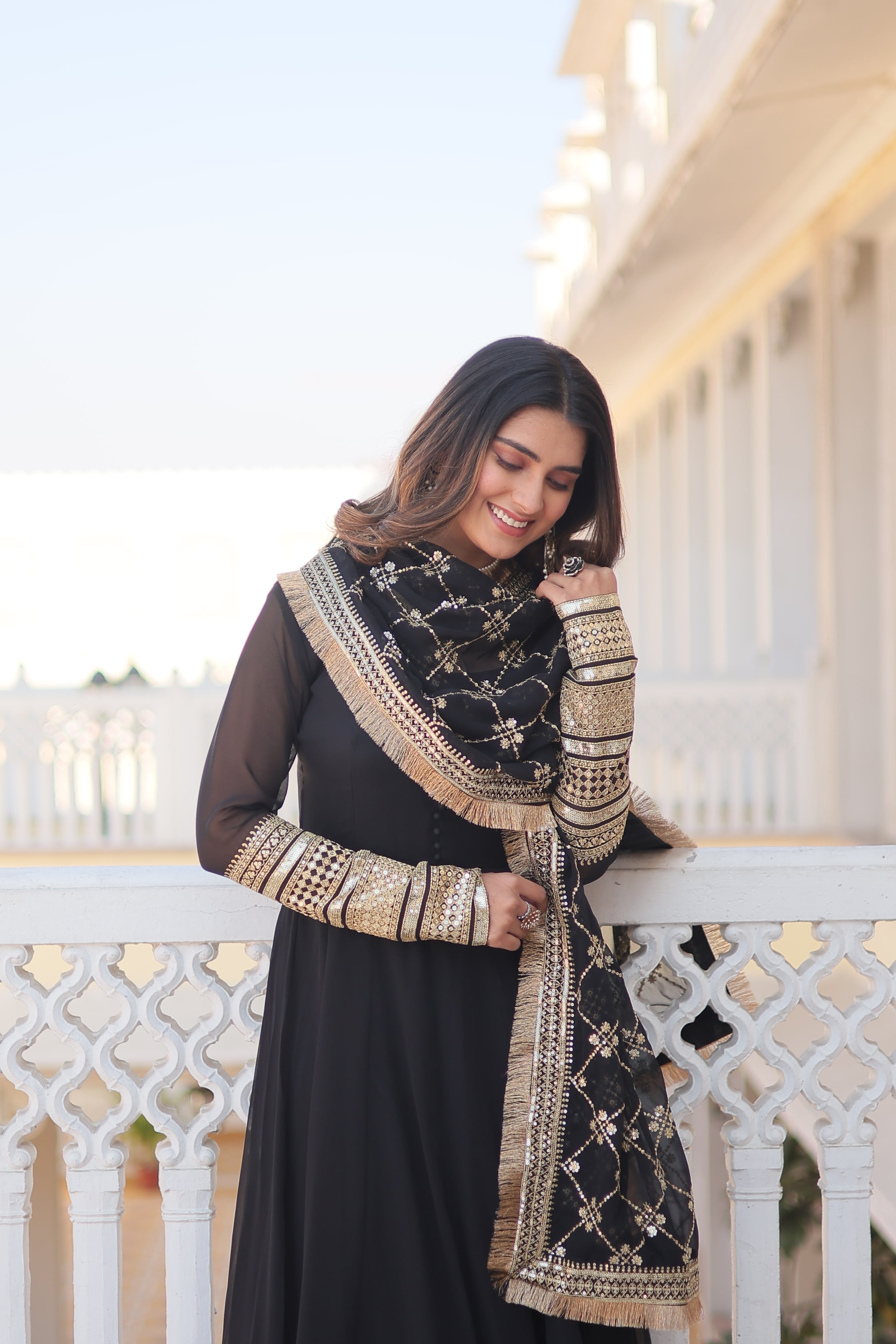 Teal embroidered georgette partywear long gown for women