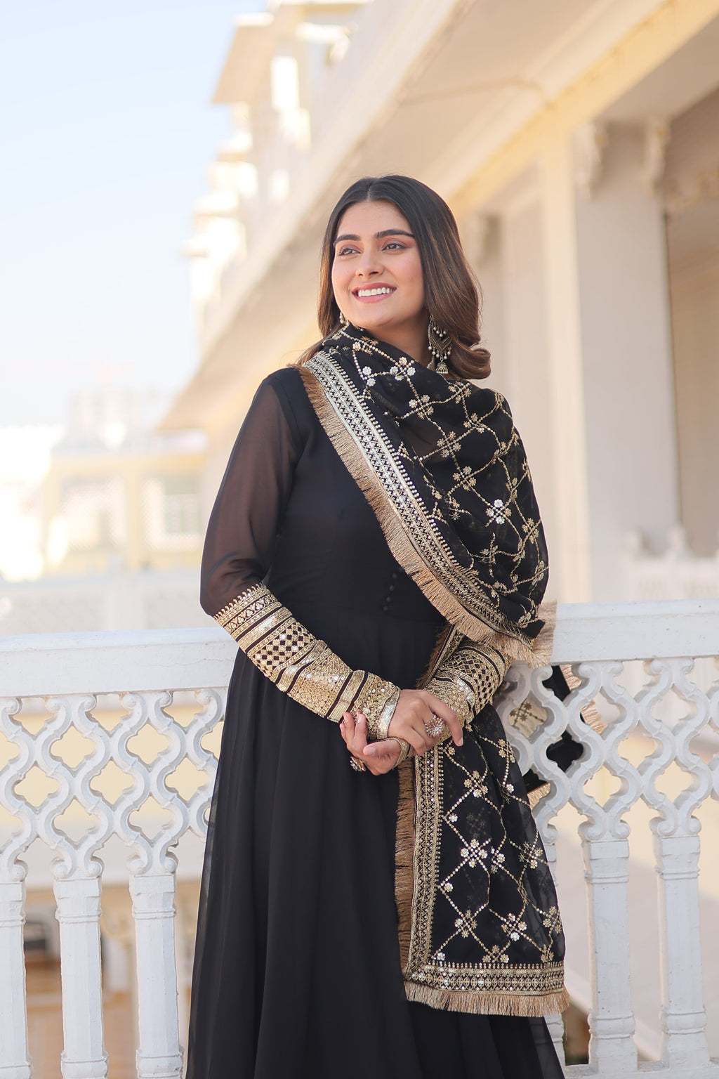 Teal embroidered georgette partywear long gown for women