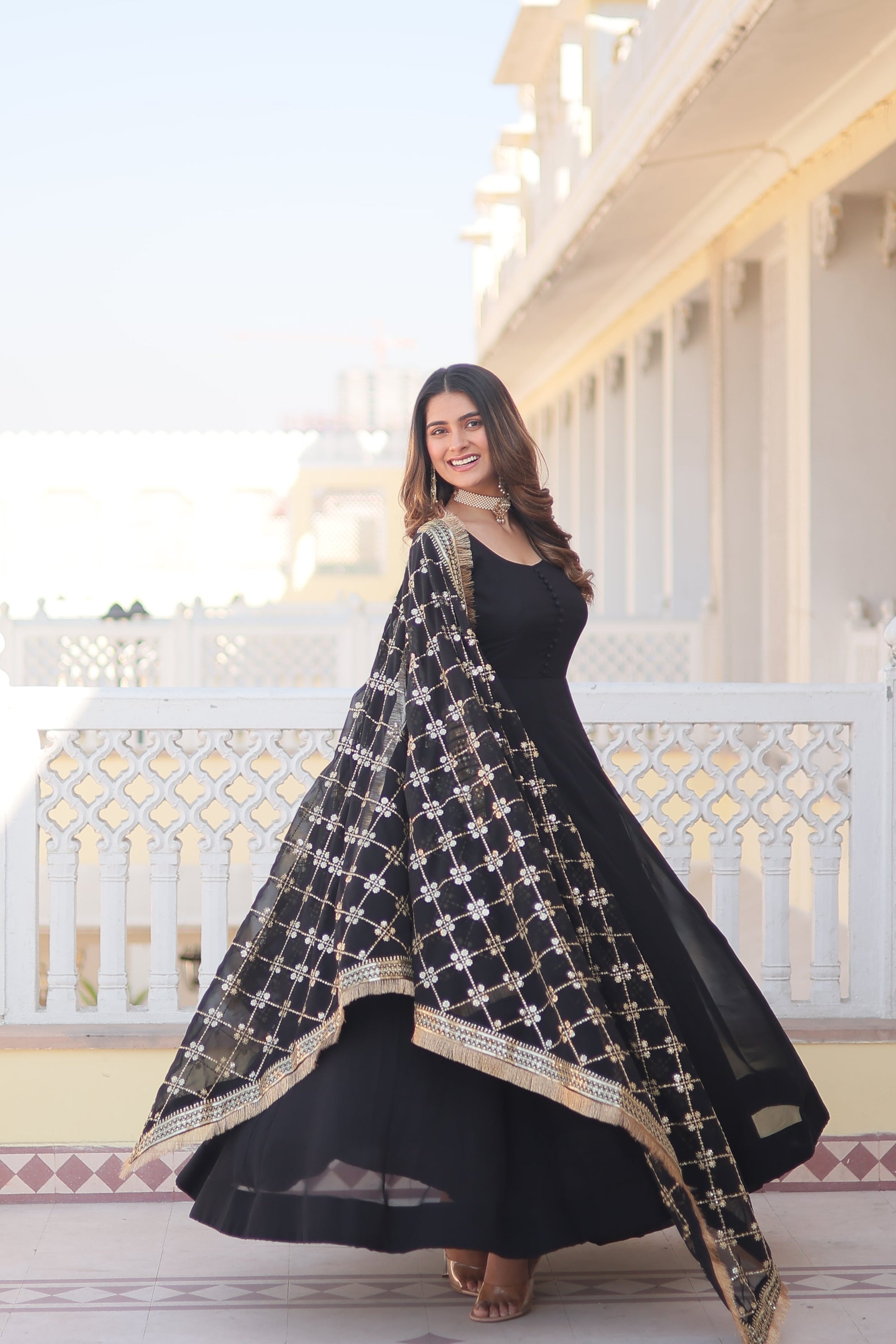 Teal embroidered georgette partywear long gown for women