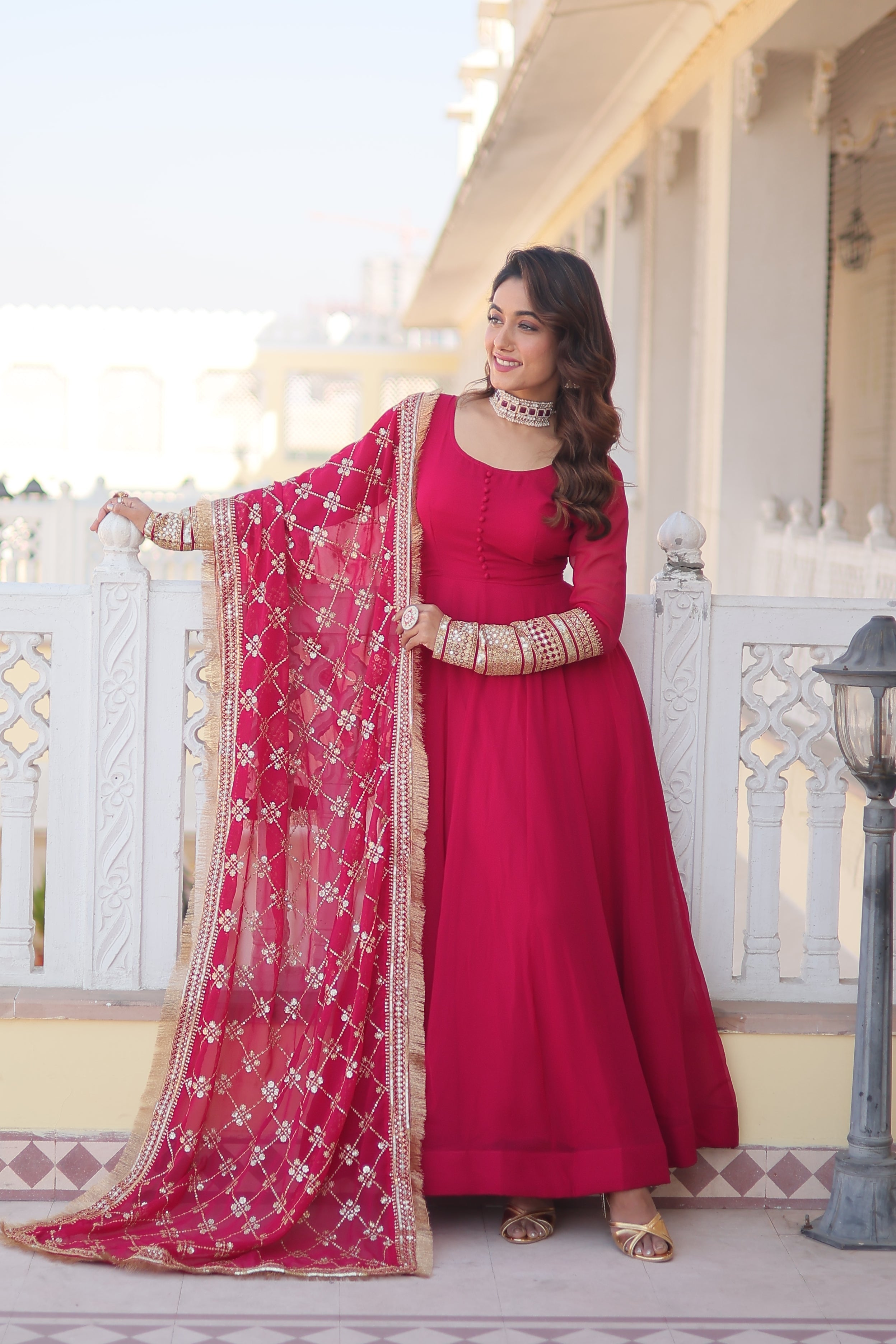 Teal embroidered georgette partywear long gown for women