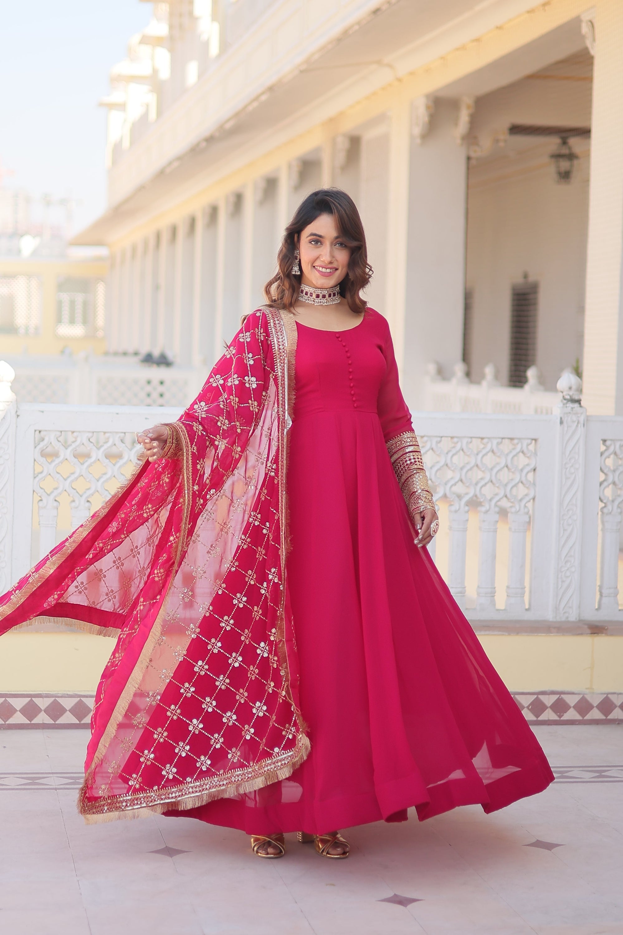 Teal embroidered georgette partywear long gown for women