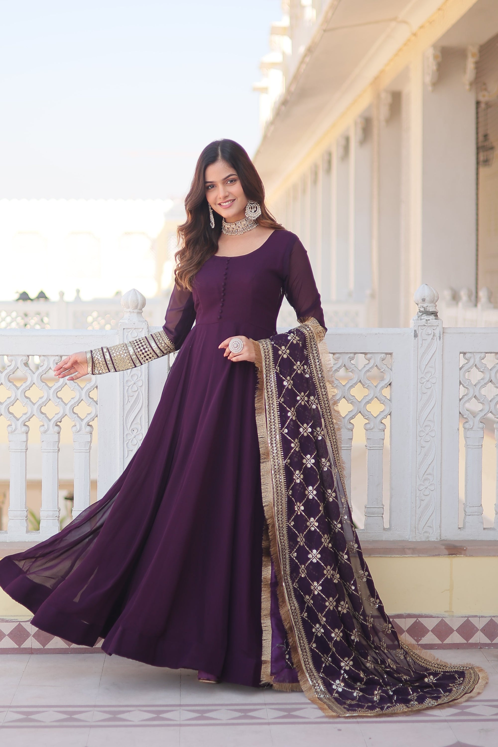 Teal embroidered georgette partywear long gown for women