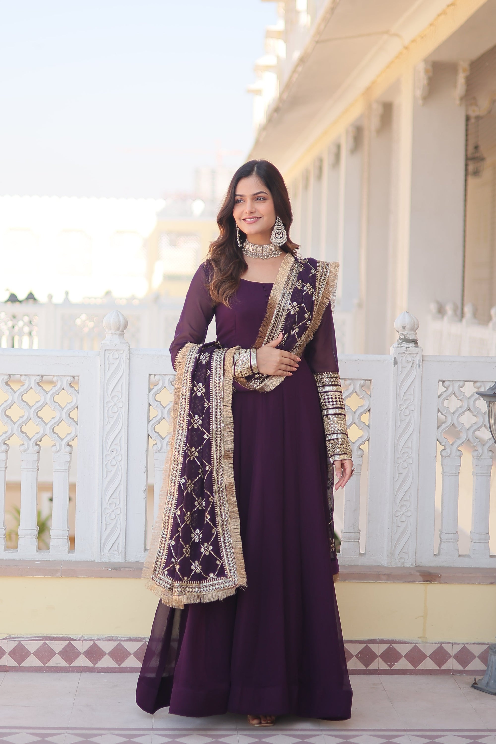 Teal embroidered georgette partywear long gown for women