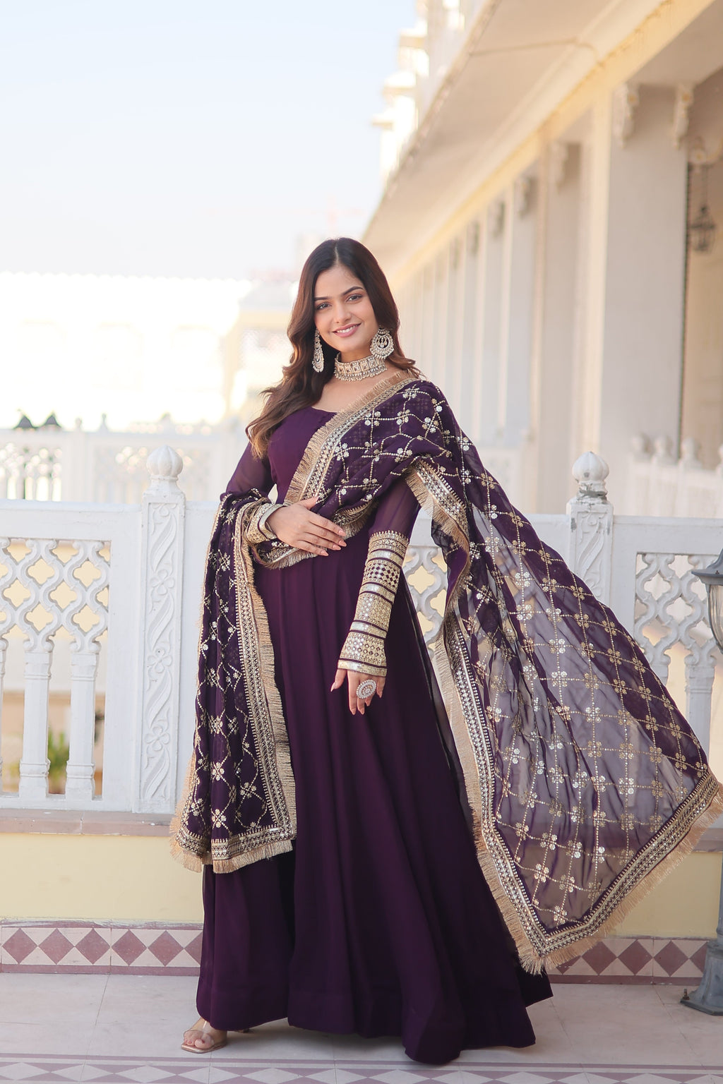 Teal embroidered georgette partywear long gown for women