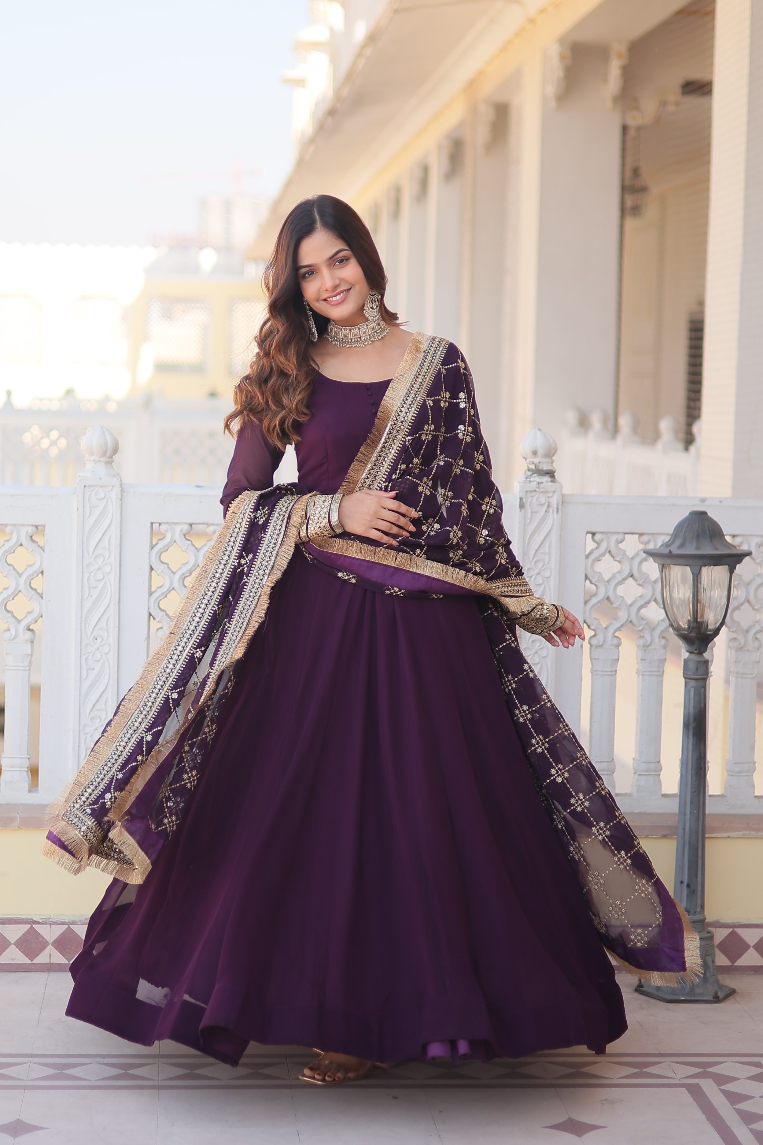 Teal embroidered georgette partywear long gown for women