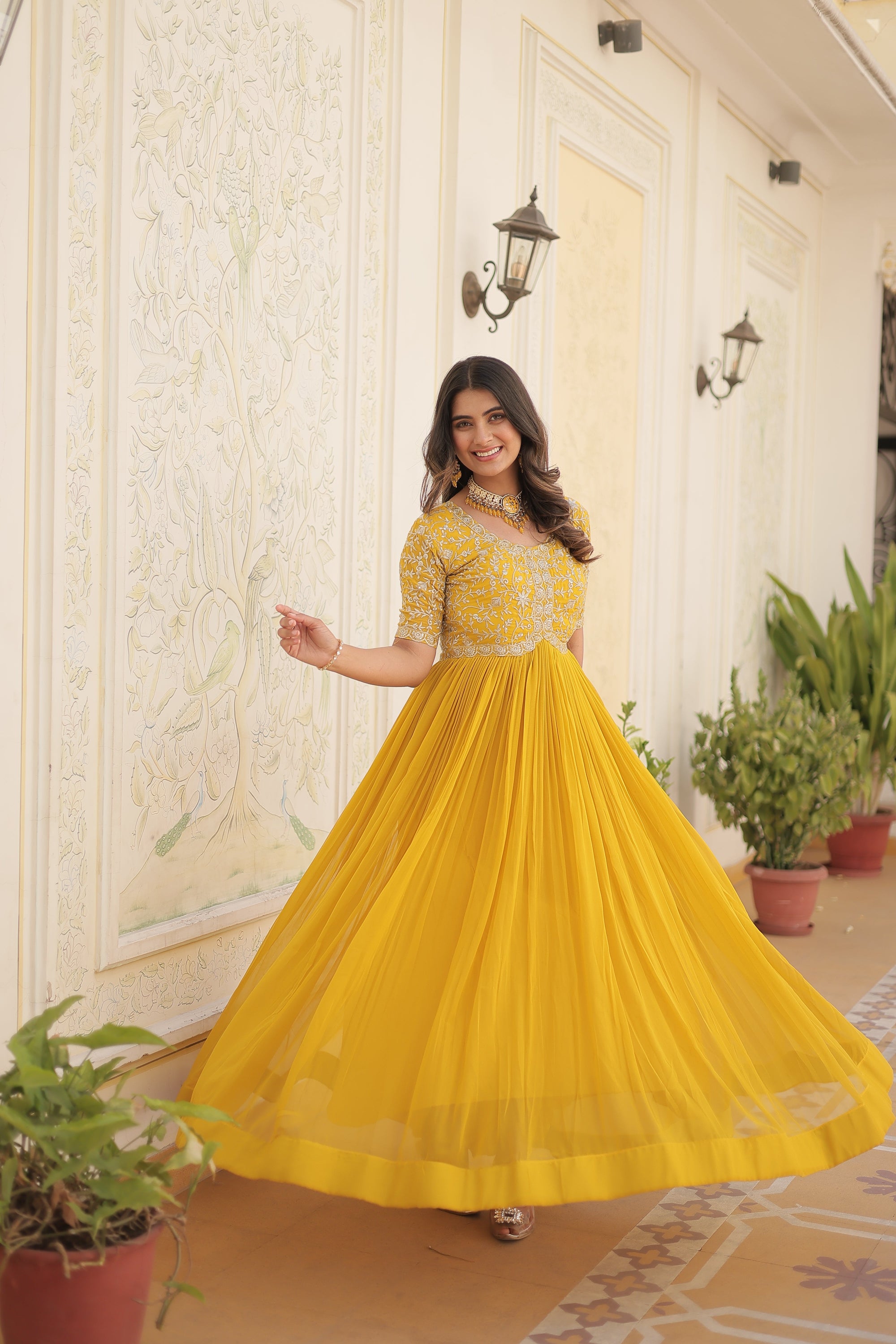 Yellow colour faux georgette trending heavy work fully stitched gown