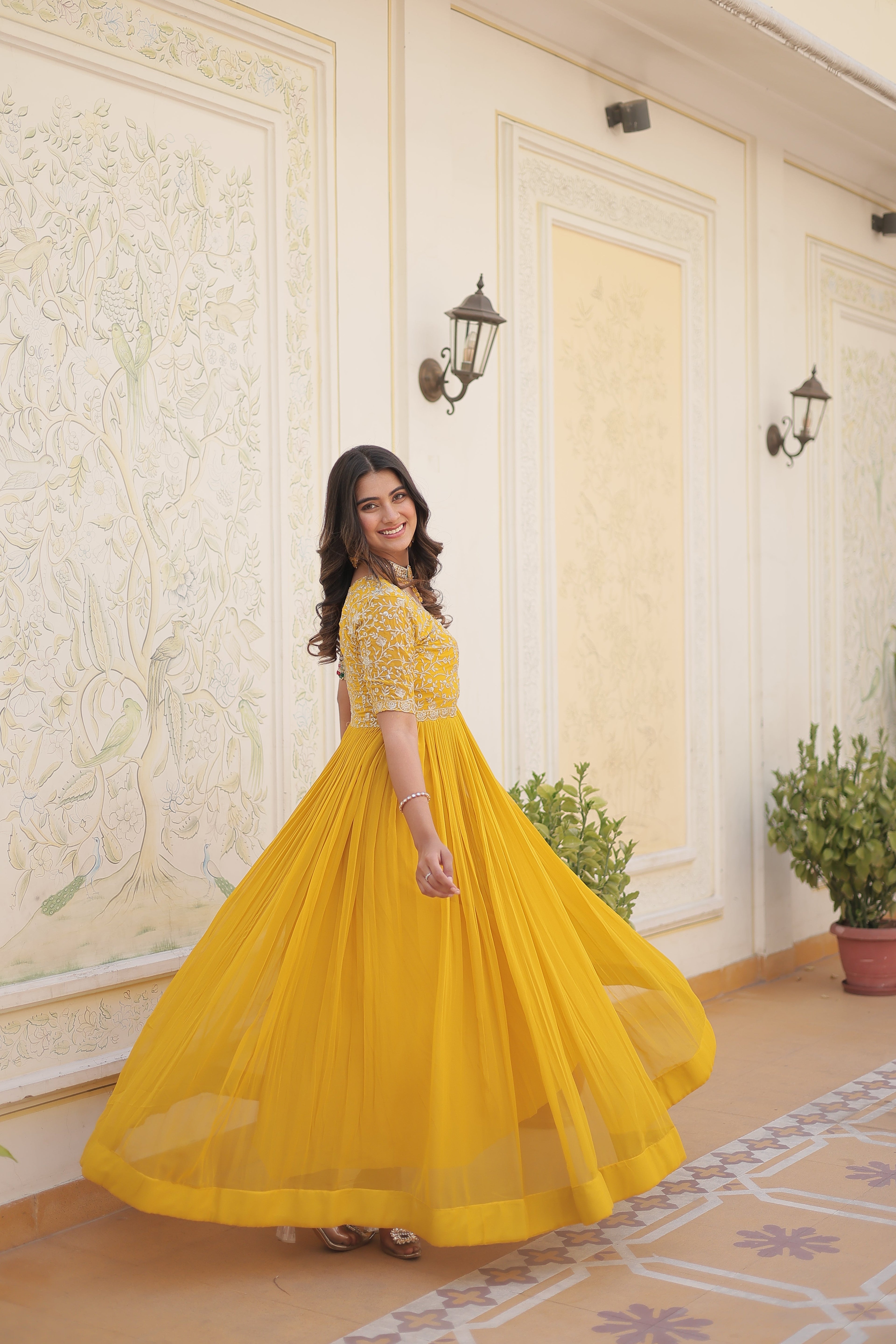 Yellow colour faux georgette trending heavy work fully stitched gown