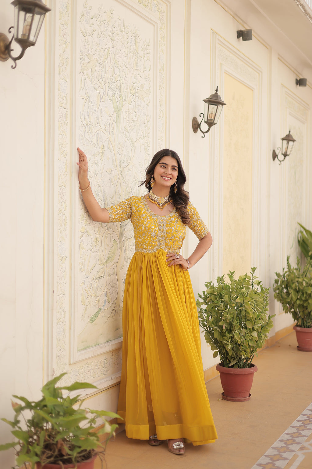Yellow colour faux georgette trending heavy work fully stitched gown