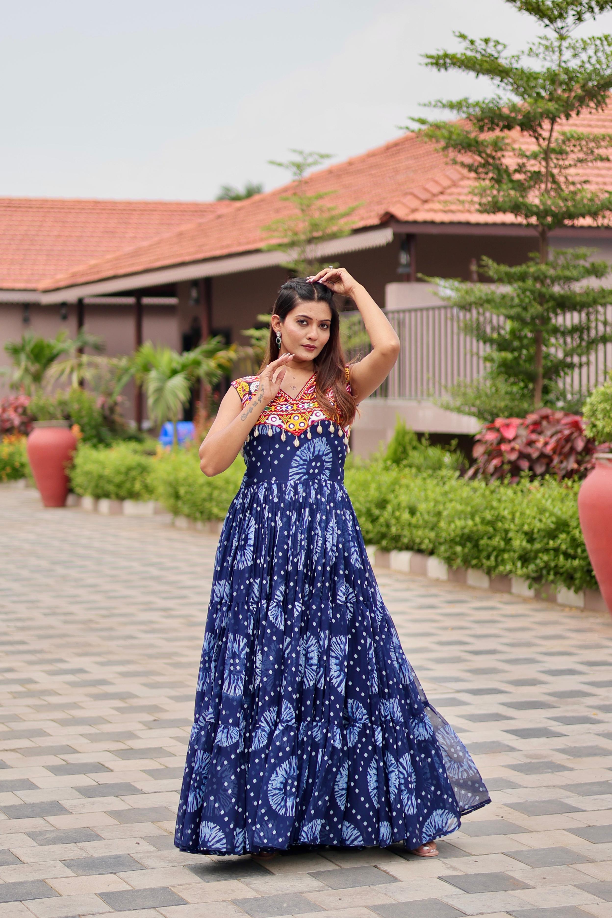 Celebrate The Spirit Of Navratri In This Vibrant Faux Georgette Gamthi Work Gowns