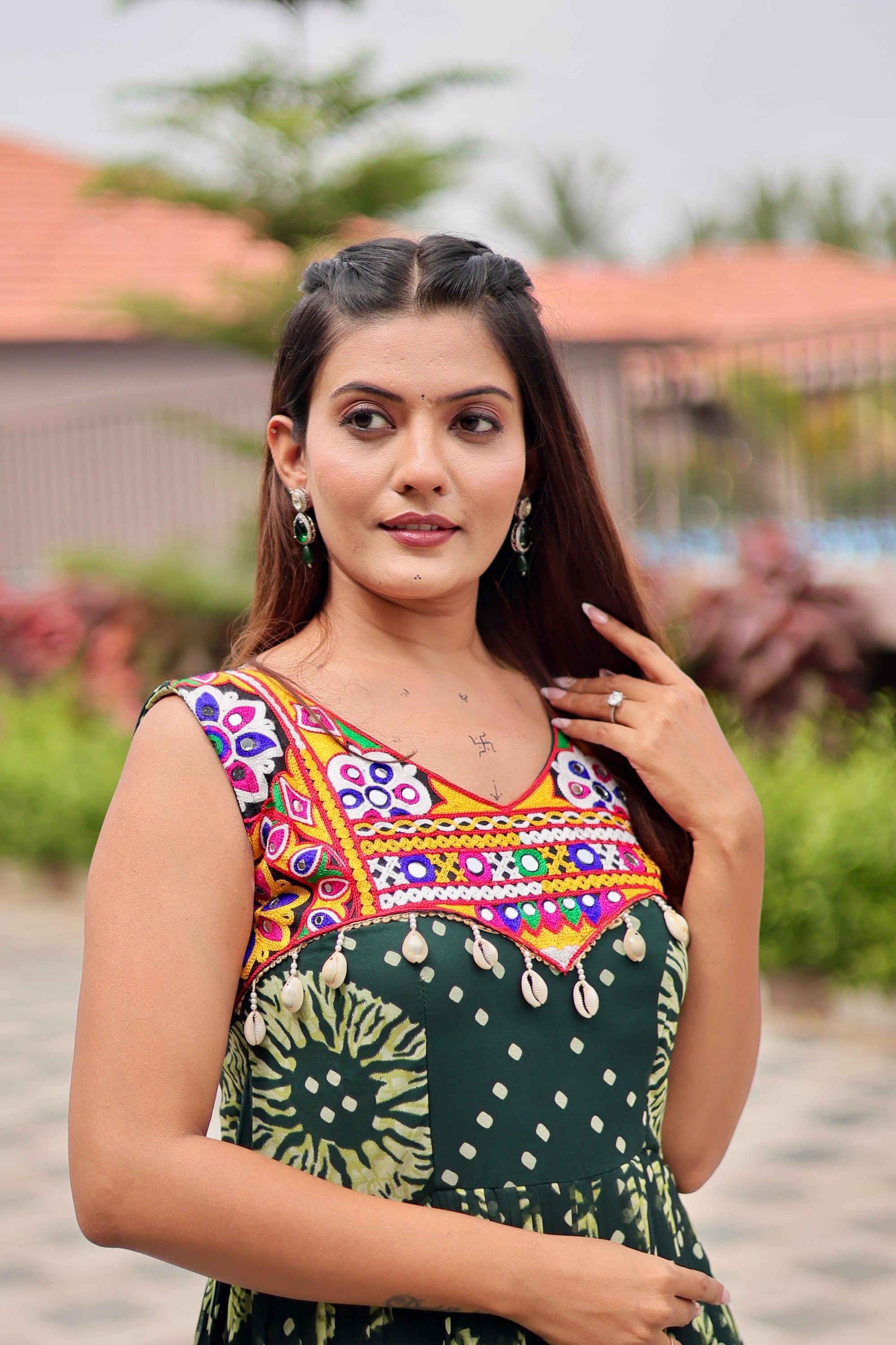 Green Celebrate The Spirit Of Navratri In This Vibrant Faux Georgette Gamthi Work Gowns