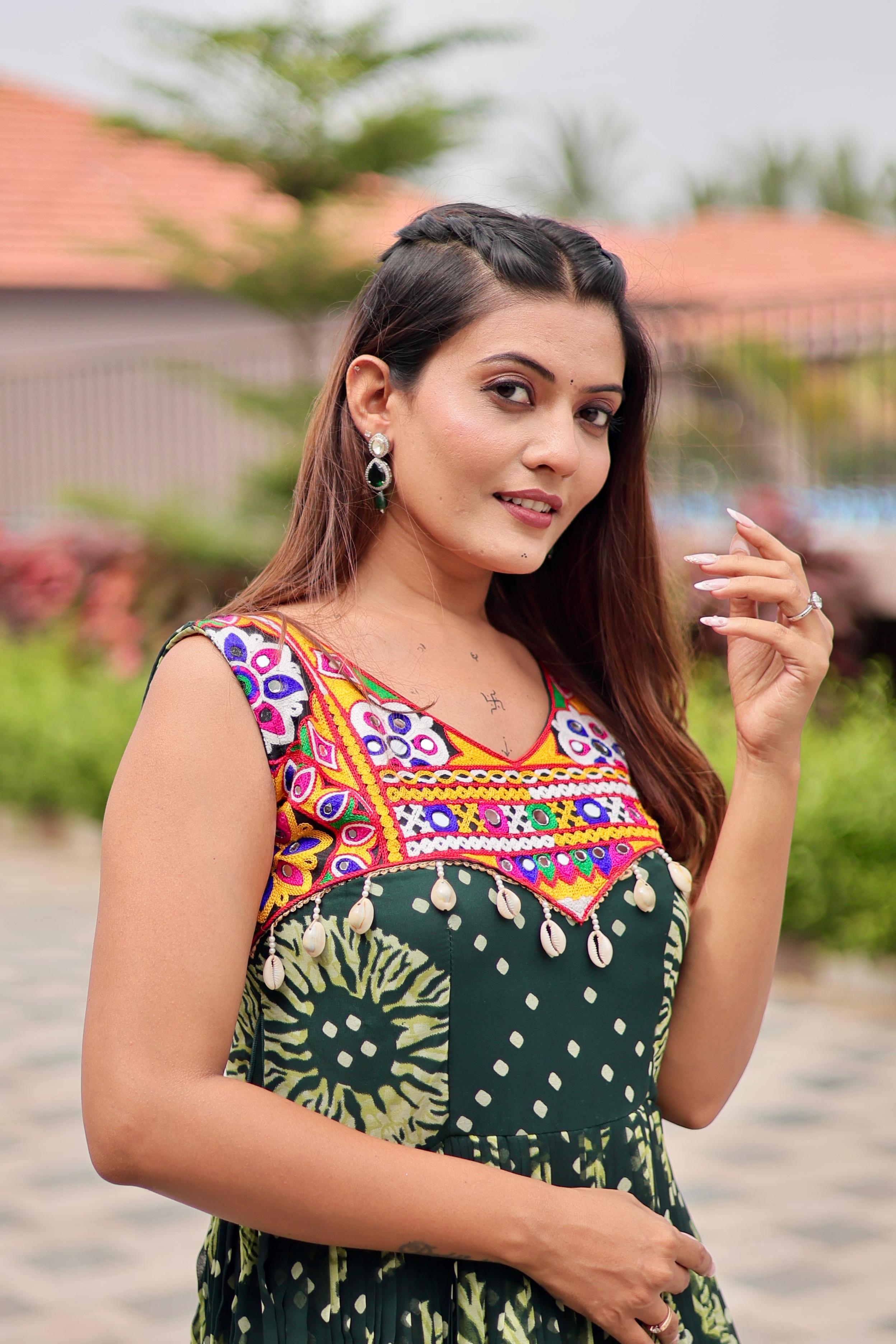 Green Celebrate The Spirit Of Navratri In This Vibrant Faux Georgette Gamthi Work Gowns