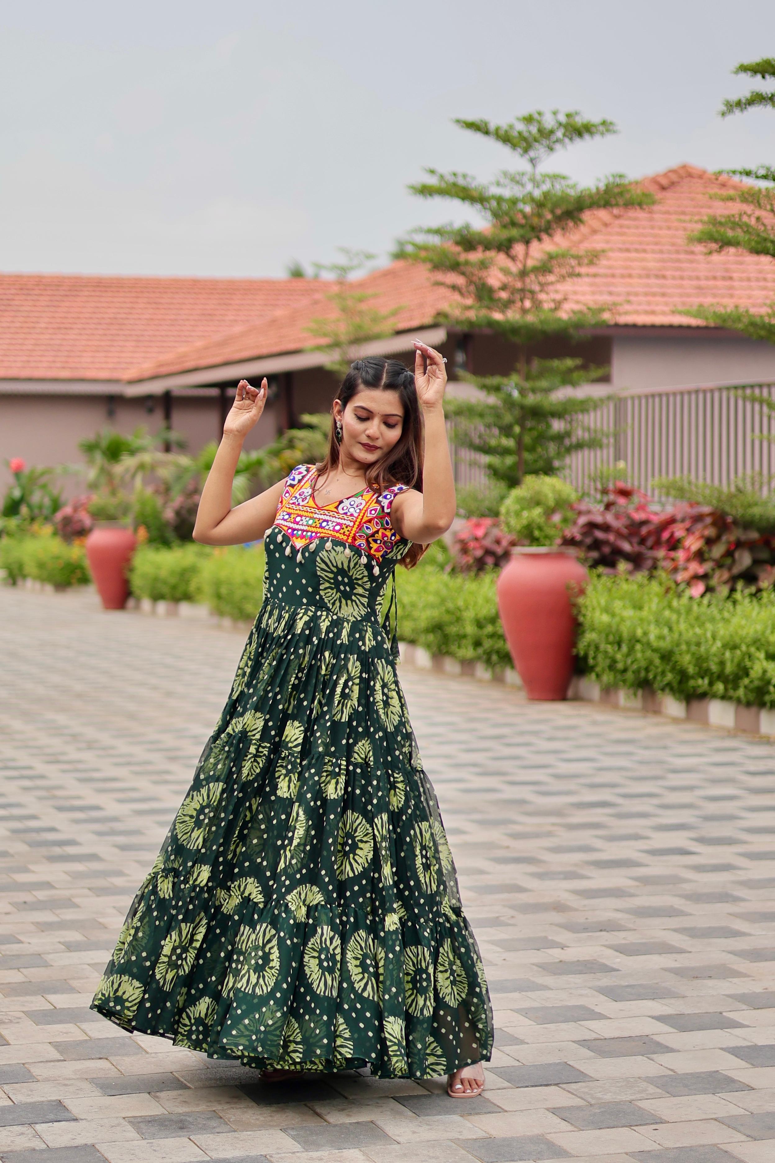 Green Celebrate The Spirit Of Navratri In This Vibrant Faux Georgette Gamthi Work Gowns