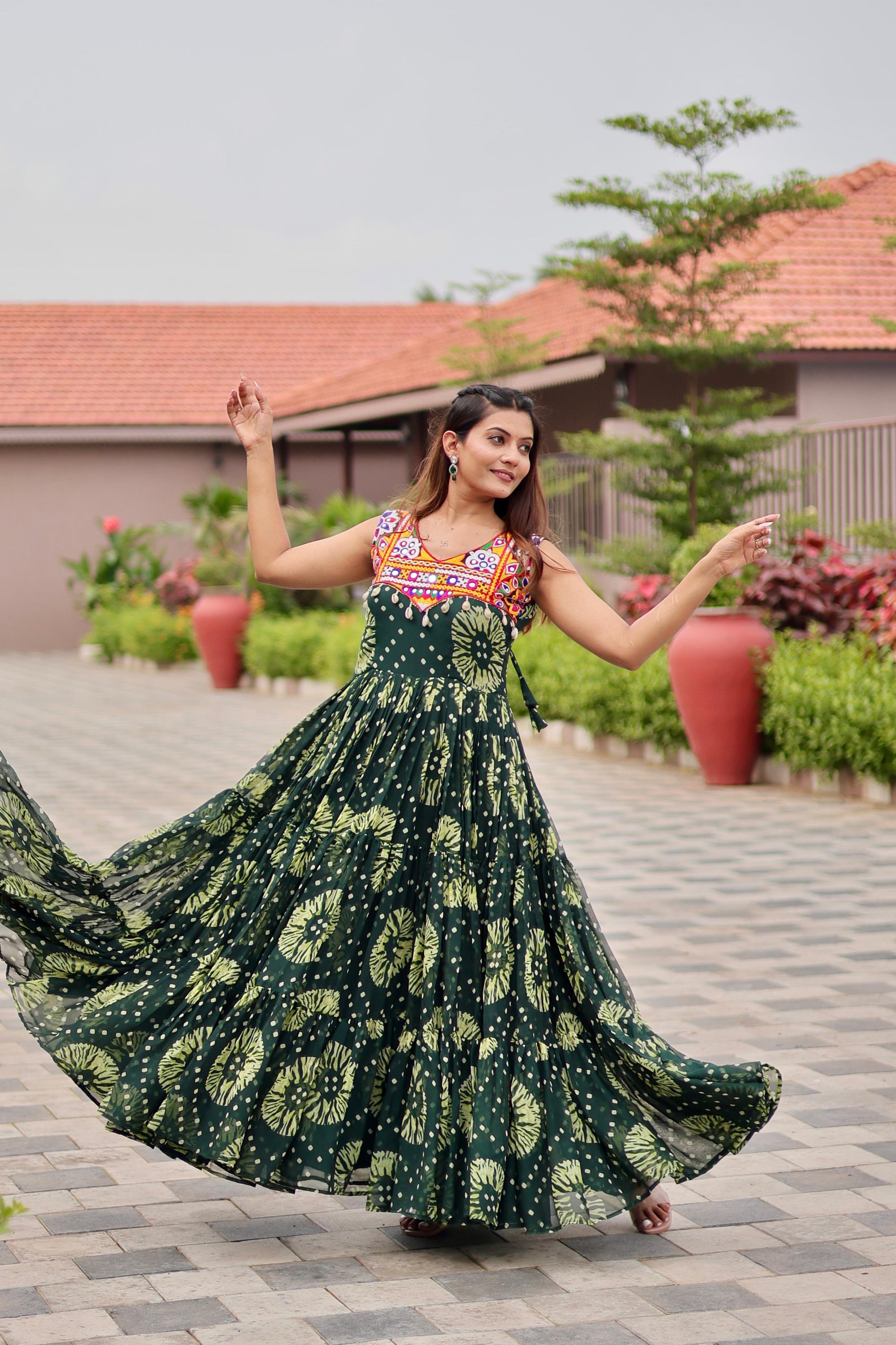 Green Celebrate The Spirit Of Navratri In This Vibrant Faux Georgette Gamthi Work Gowns