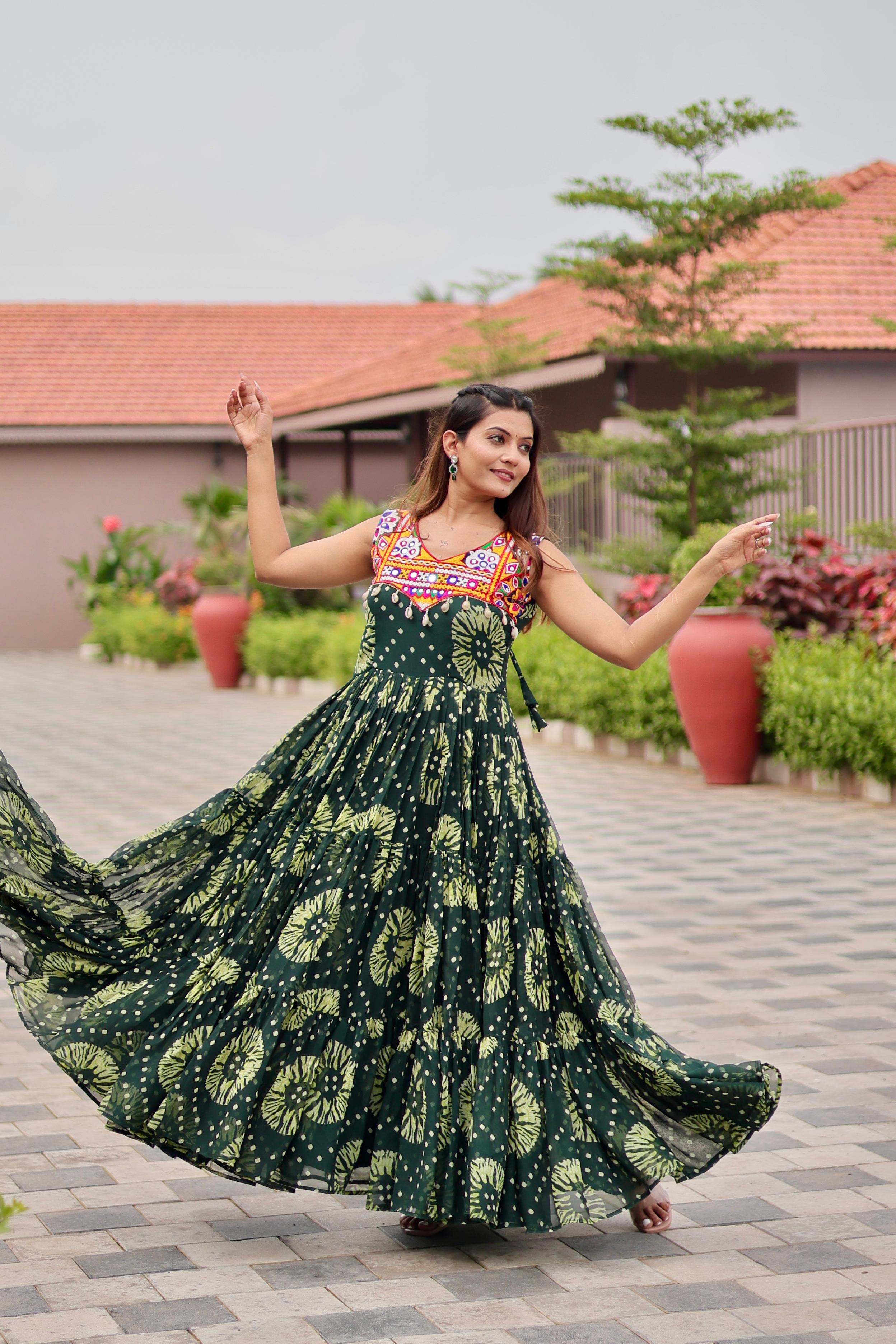 Green Celebrate The Spirit Of Navratri In This Vibrant Faux Georgette Gamthi Work Gowns